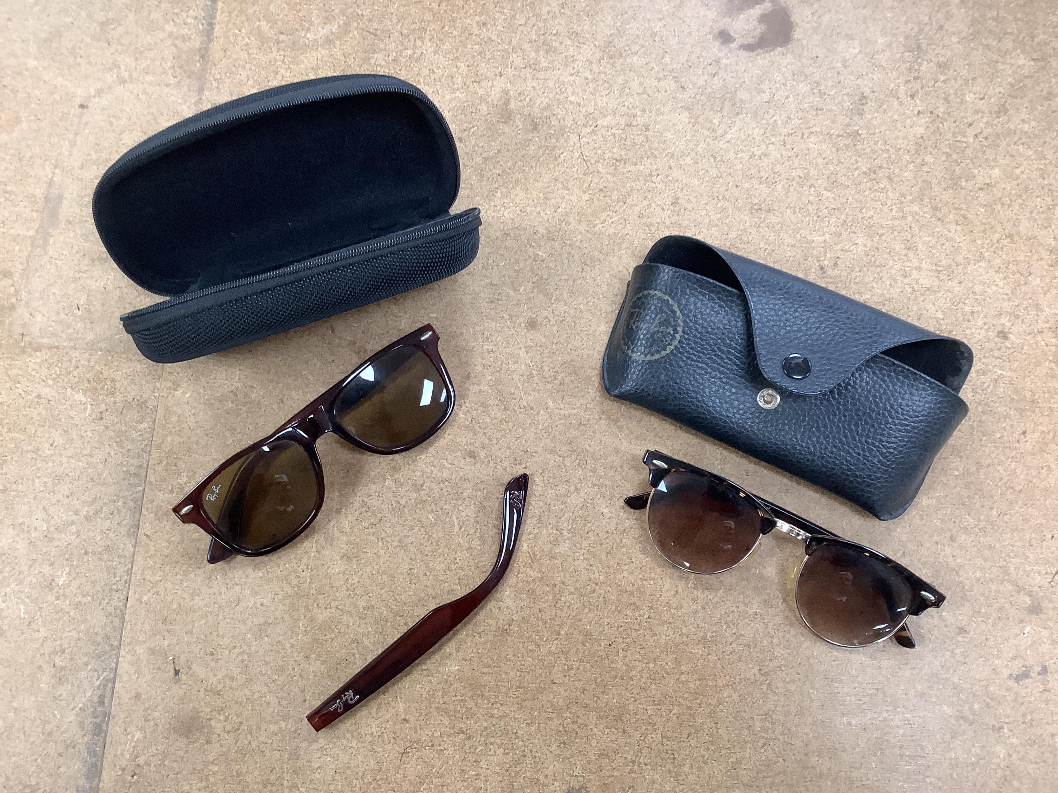 A collection of vintage Ray-Bans and other sunglasses